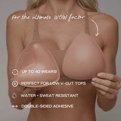 Woman holding a silicone bra cup with text highlighting features on a plain background