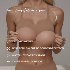 Person holding two silicone breast forms with promotional text on a neutral background