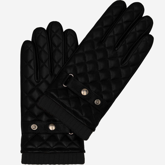 Black quilted gloves with pearl embellishments on a white background