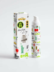 Bottle and packaging with New York City-themed design on a white background