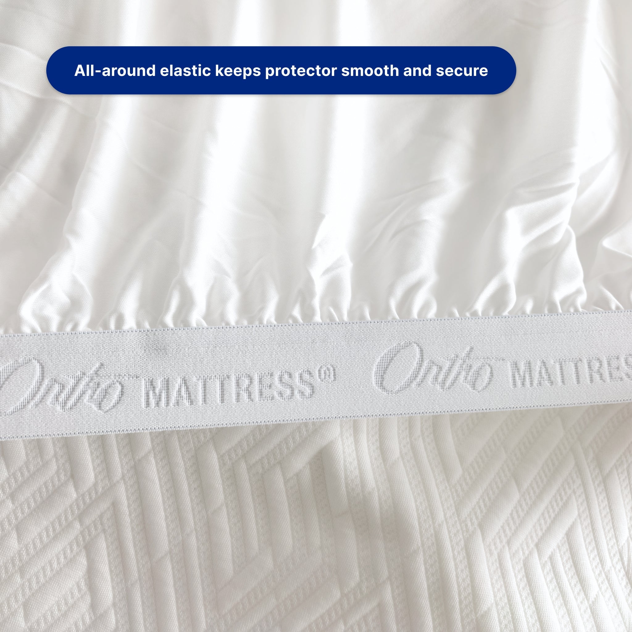 White mattress protector with 'Ontio Mattress' branding and text about elastic security.
