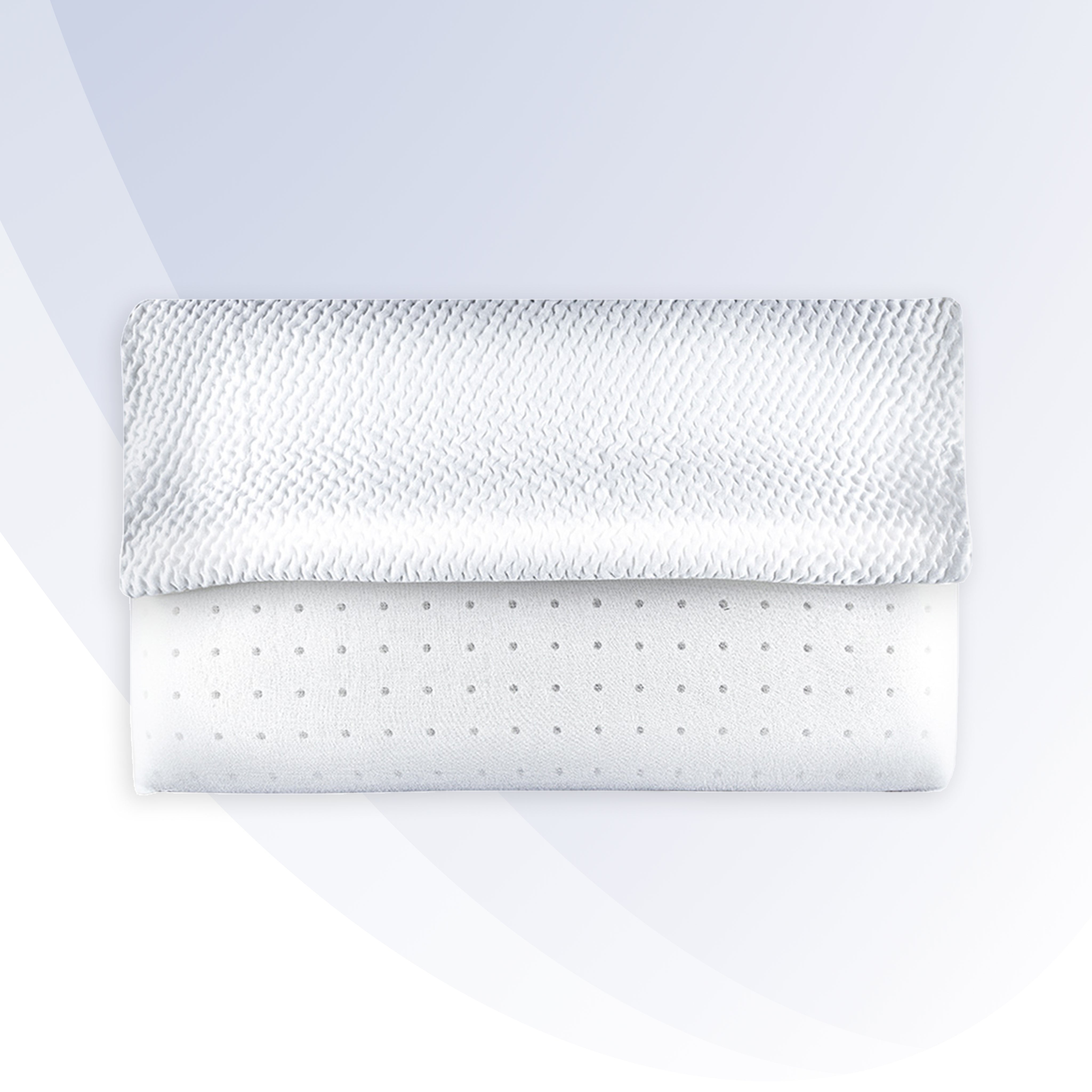 White pillow with textured surface on a white background