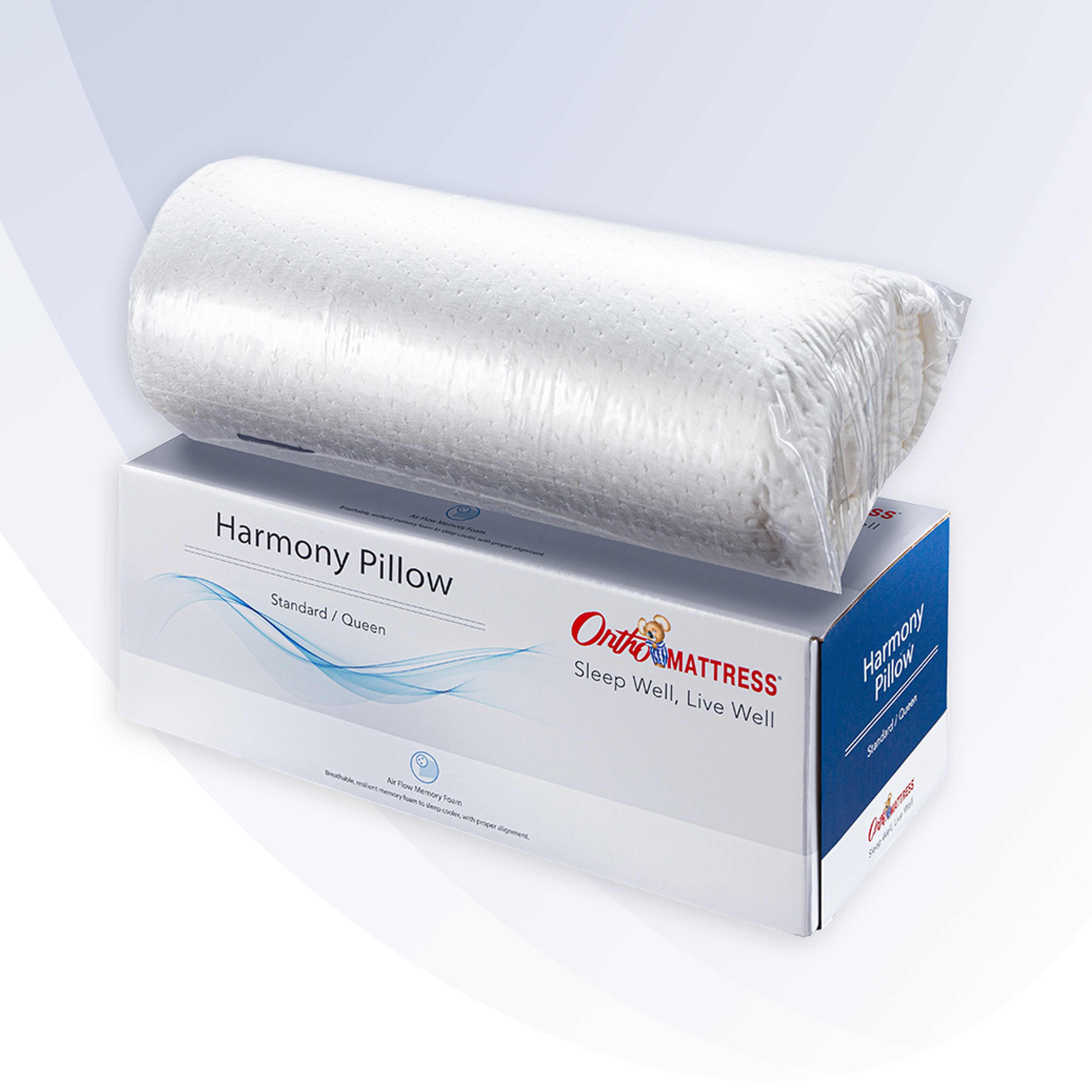 Roll of Harmony Pillow on OrthoMattress packaging with a white background