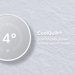 CoolQuilt product with temperature display on a textured fabric background