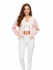 Woman wearing a light pink jacket with orange accents on a white background