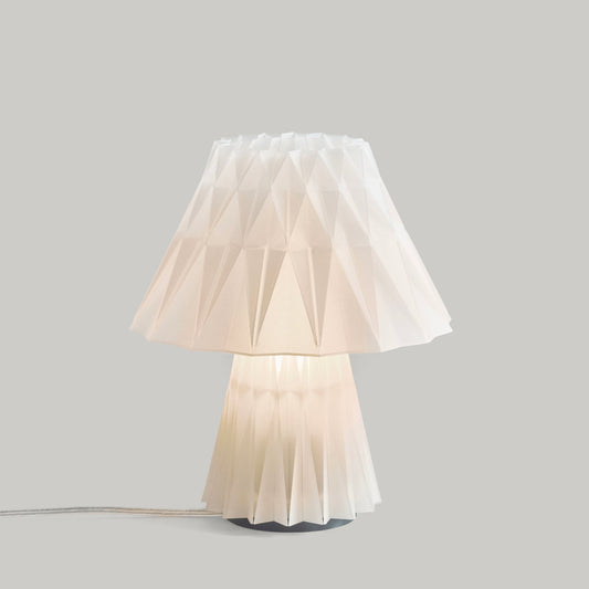 Table lamp with a unique design on a gray background
