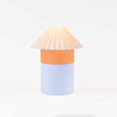 Decorative lamp with a pleated design on a white background