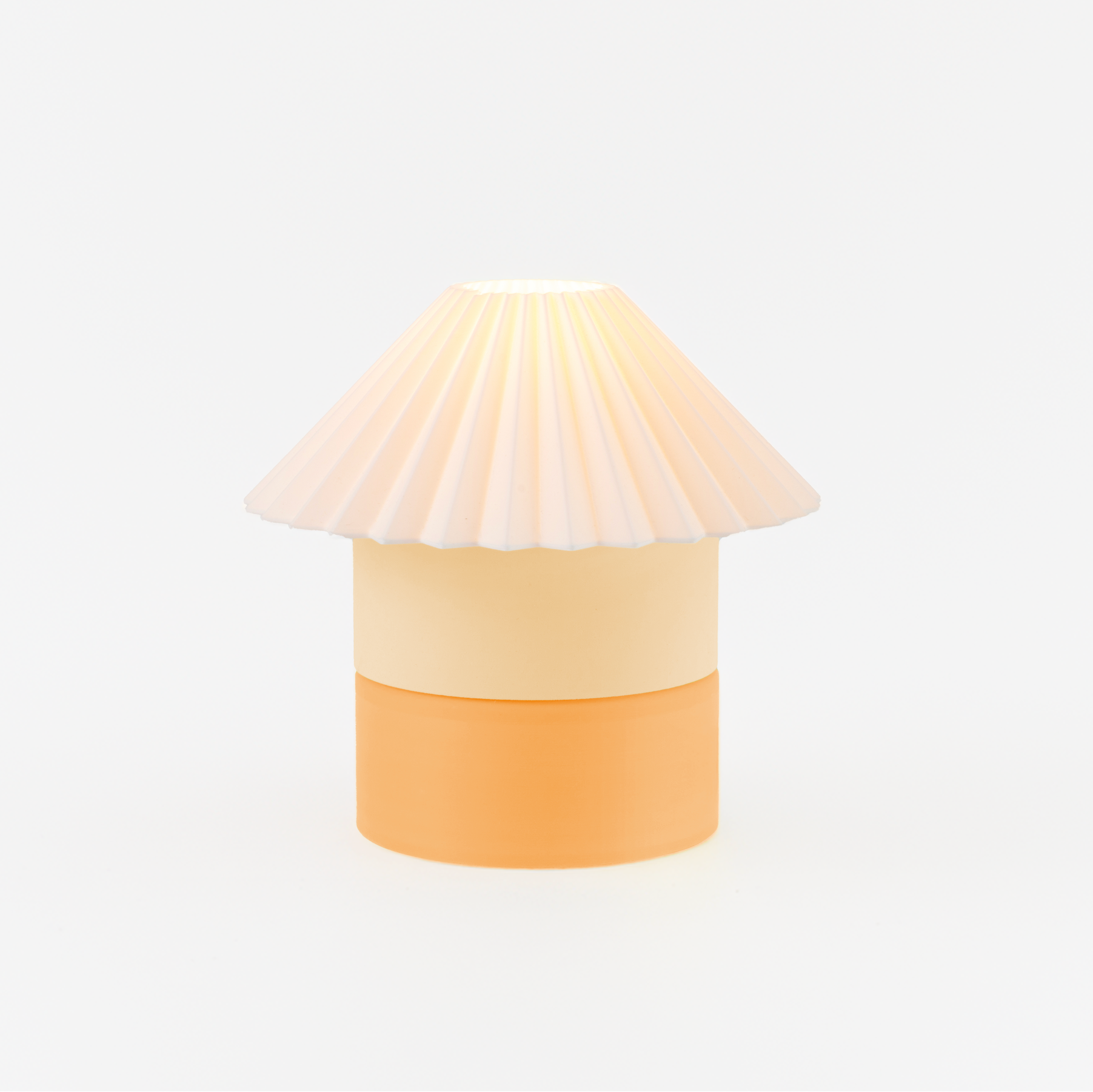 Lamp with a shell-like design on a white background