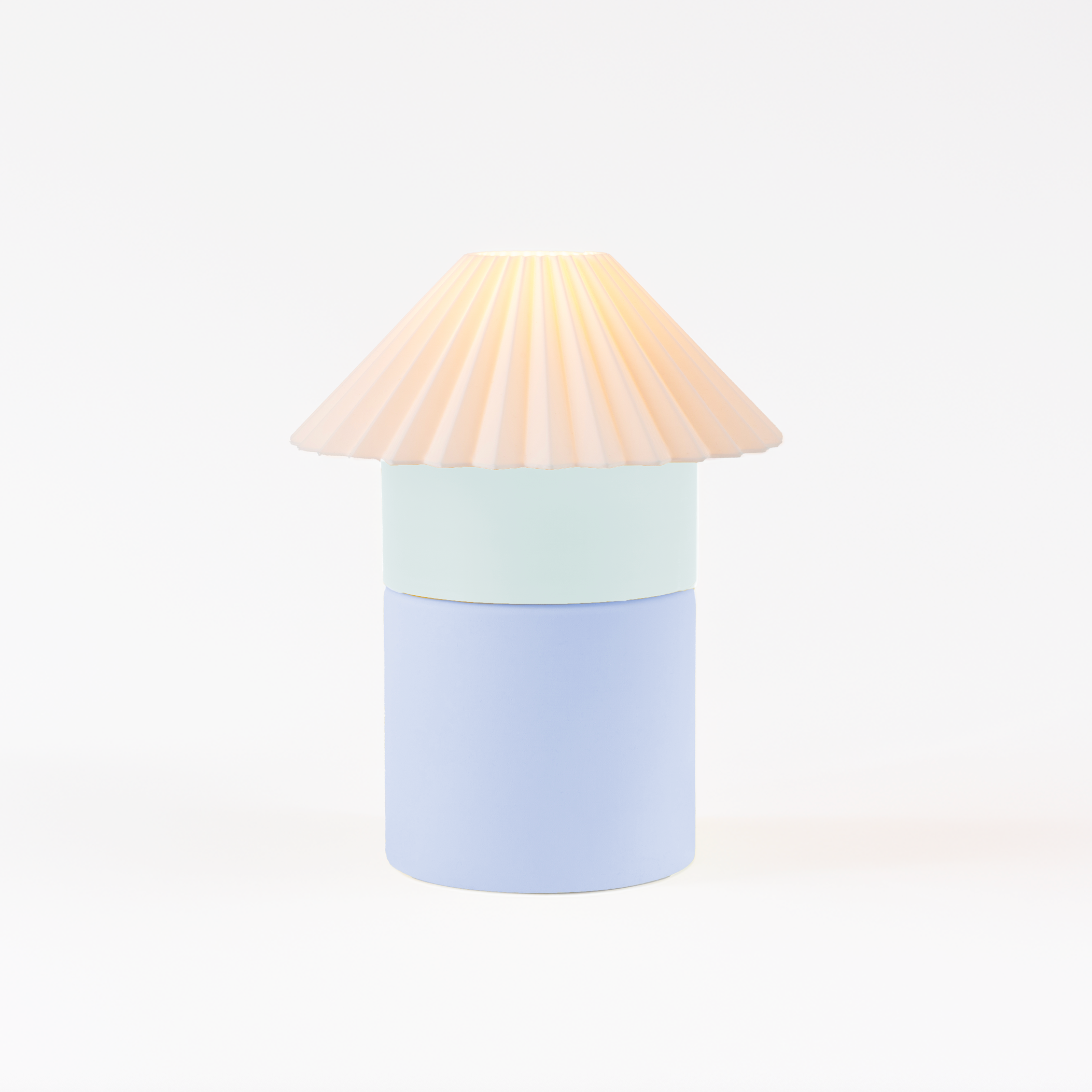 Colorful lamp with a cone-shaped shade on a white background
