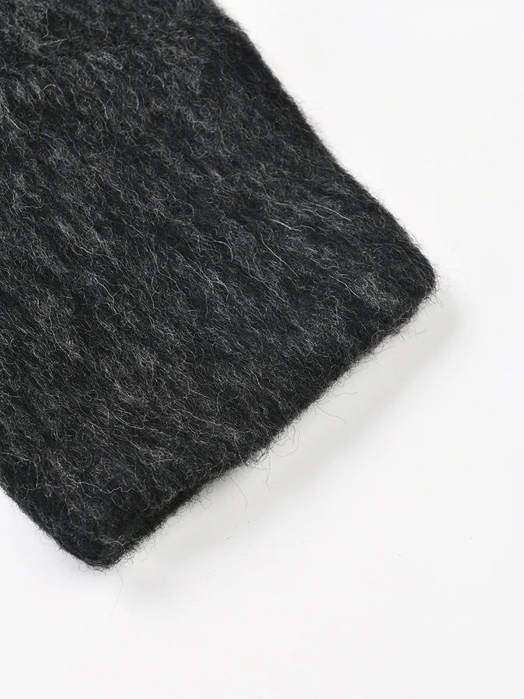 Dark gray knitted fabric on a white background
