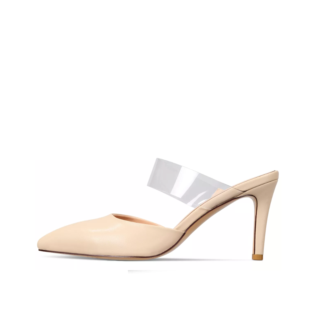 Beige high-heeled shoe with clear strap on a white background