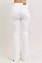 White jeans on a plain background