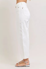 White pants worn by a person on a white background