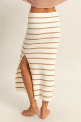 White skirt with brown stripes on a plain background