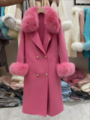 Pink coat with fur trim in a clothing store setting