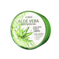 A jar of Aloe Vera soothing gel with a green lid, alongside slices of aloe vera and aloe leaves. The label on the jar indicates it is 100% pure Aloe Vera gel.