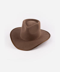 Brown cowboy hat on a white background