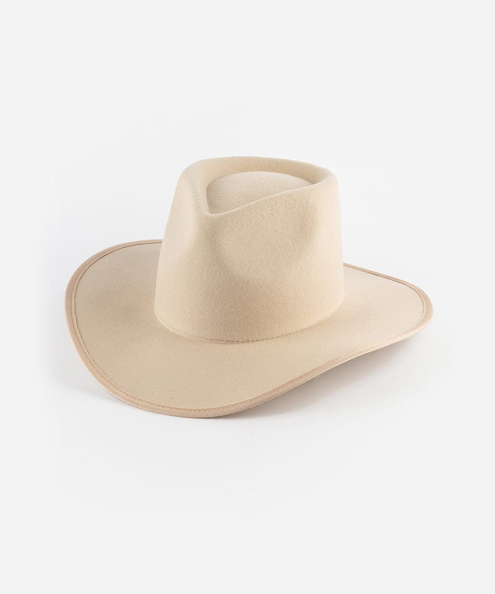 Beige cowboy hat on a white background