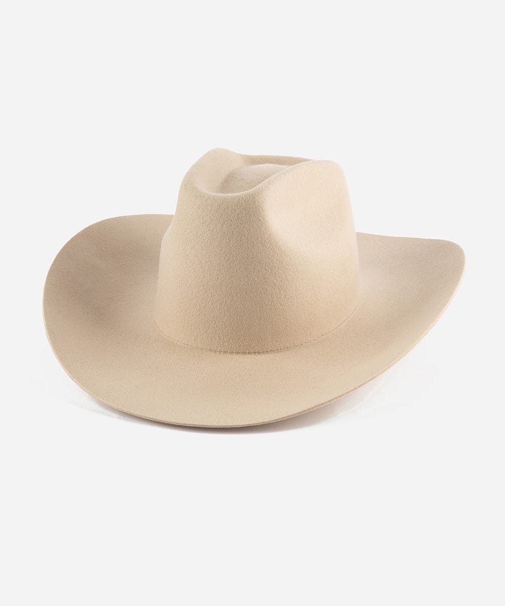 Beige cowboy hat on a white background