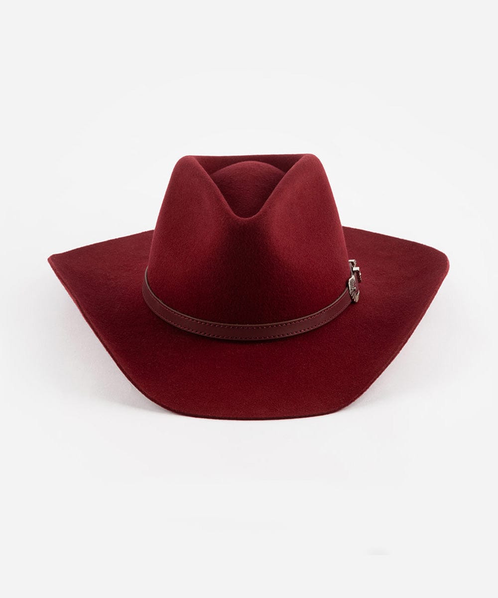 Red cowboy hat with a band on a white background