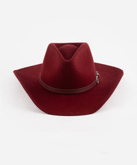 Red cowboy hat with a band on a white background