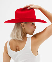 Person wearing a red hat on a white background