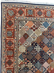 Hand-Knotted Indo-Joshegan Wool Rug – 12'2" x 9'1" – Geometric Medallion Design, Rich Warm Palette Rugistan