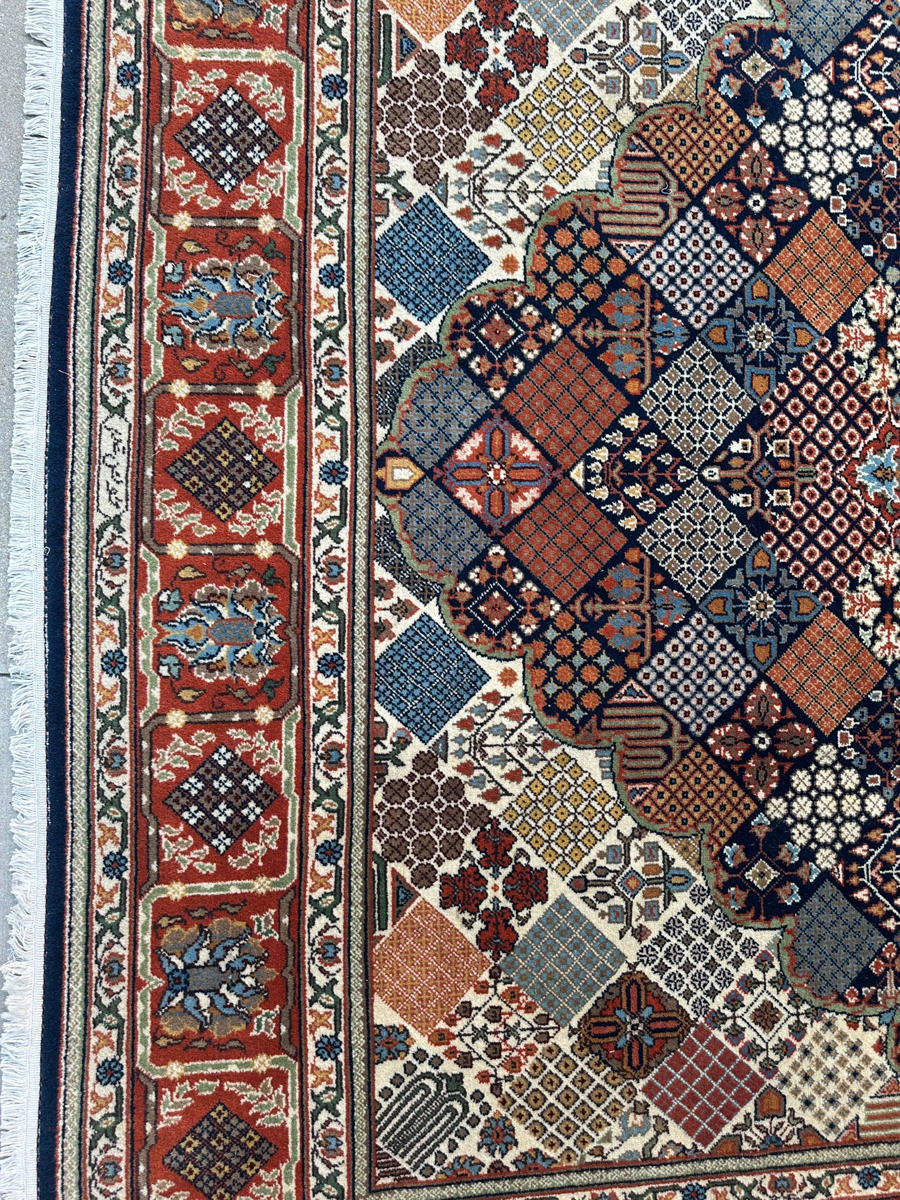 Hand-Knotted Indo-Joshegan Wool Rug – 12'2" x 9'1" – Geometric Medallion Design, Rich Warm Palette Rugistan