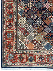 Hand-Knotted Indo-Joshegan Wool Rug – 12'2" x 9'1" – Geometric Medallion Design, Rich Warm Palette Rugistan