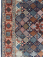 Hand-Knotted Indo-Joshegan Wool Rug – 12'2" x 9'1" – Geometric Medallion Design, Rich Warm Palette Rugistan