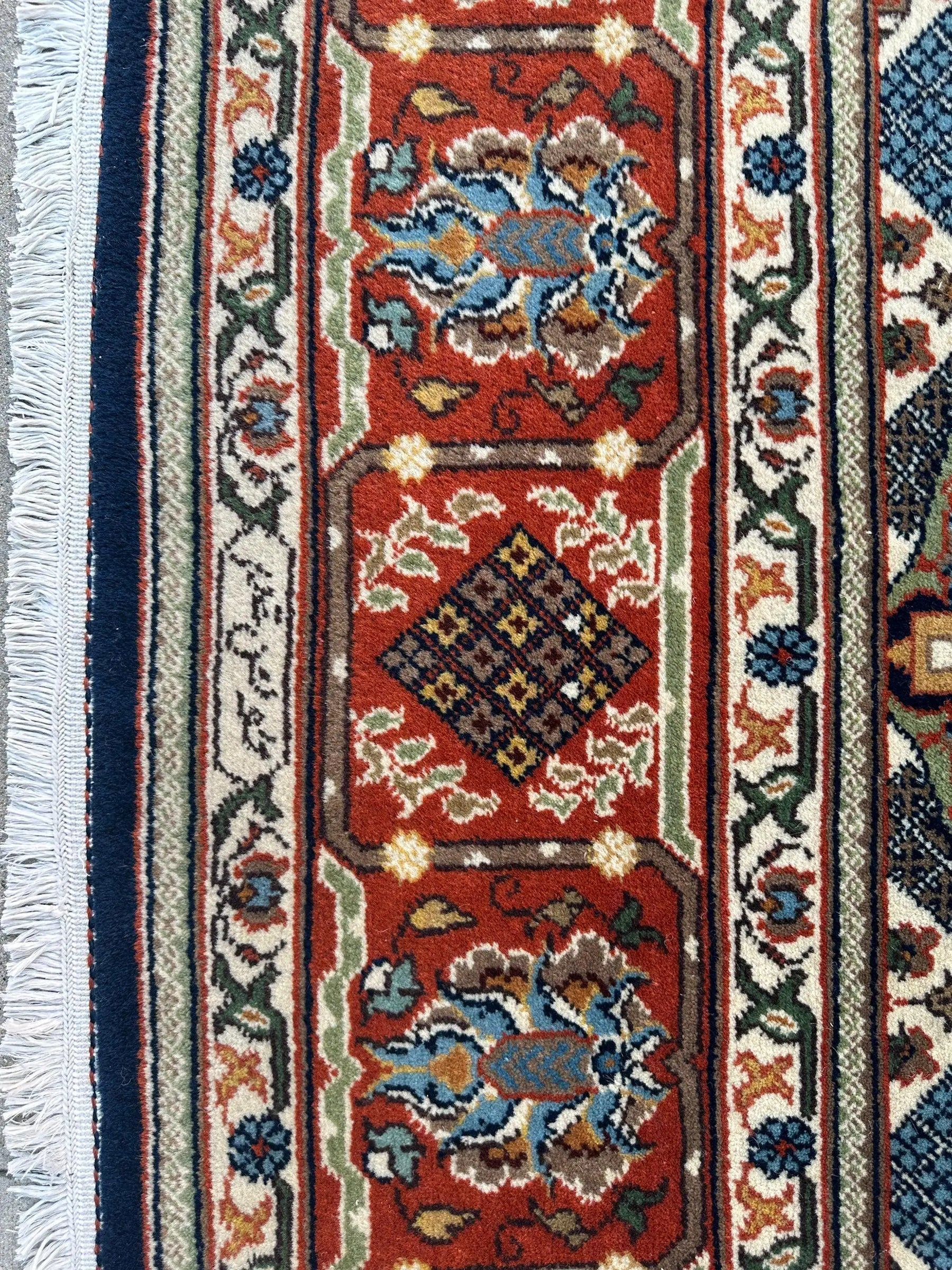 Hand-Knotted Indo-Joshegan Wool Rug – 12'2" x 9'1" – Geometric Medallion Design, Rich Warm Palette Rugistan