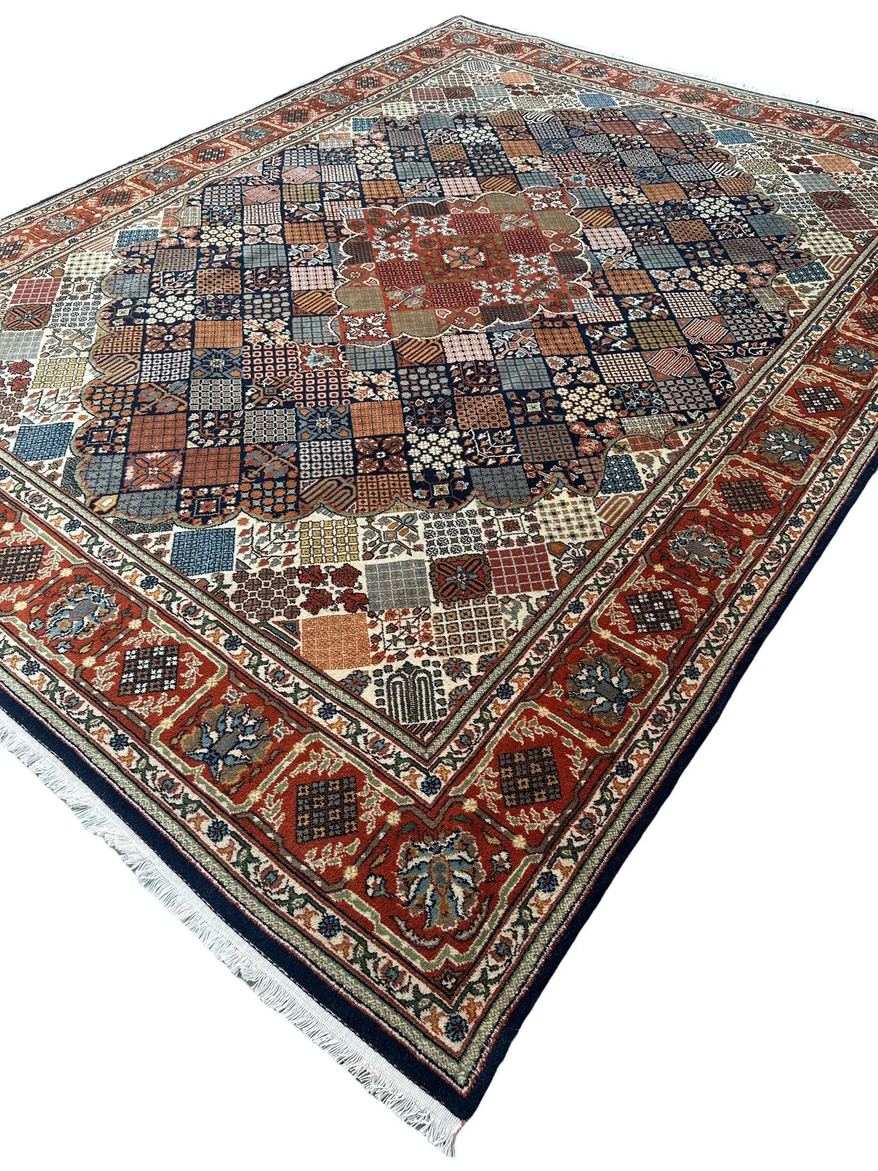 Hand-Knotted Indo-Joshegan Wool Rug – 12'2" x 9'1" – Geometric Medallion Design, Rich Warm Palette Rugistan
