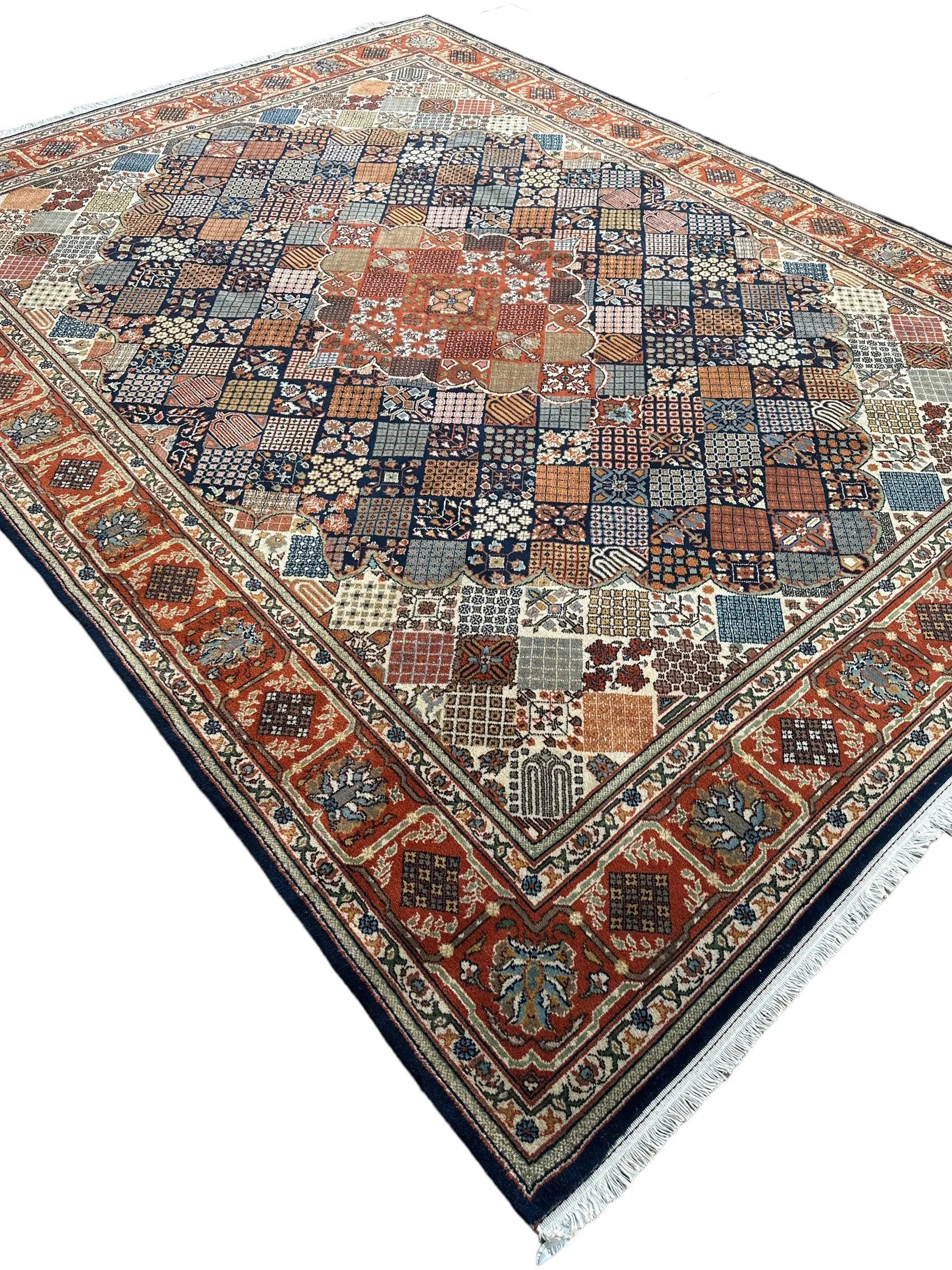 Hand-Knotted Indo-Joshegan Wool Rug – 12'2" x 9'1" – Geometric Medallion Design, Rich Warm Palette Rugistan