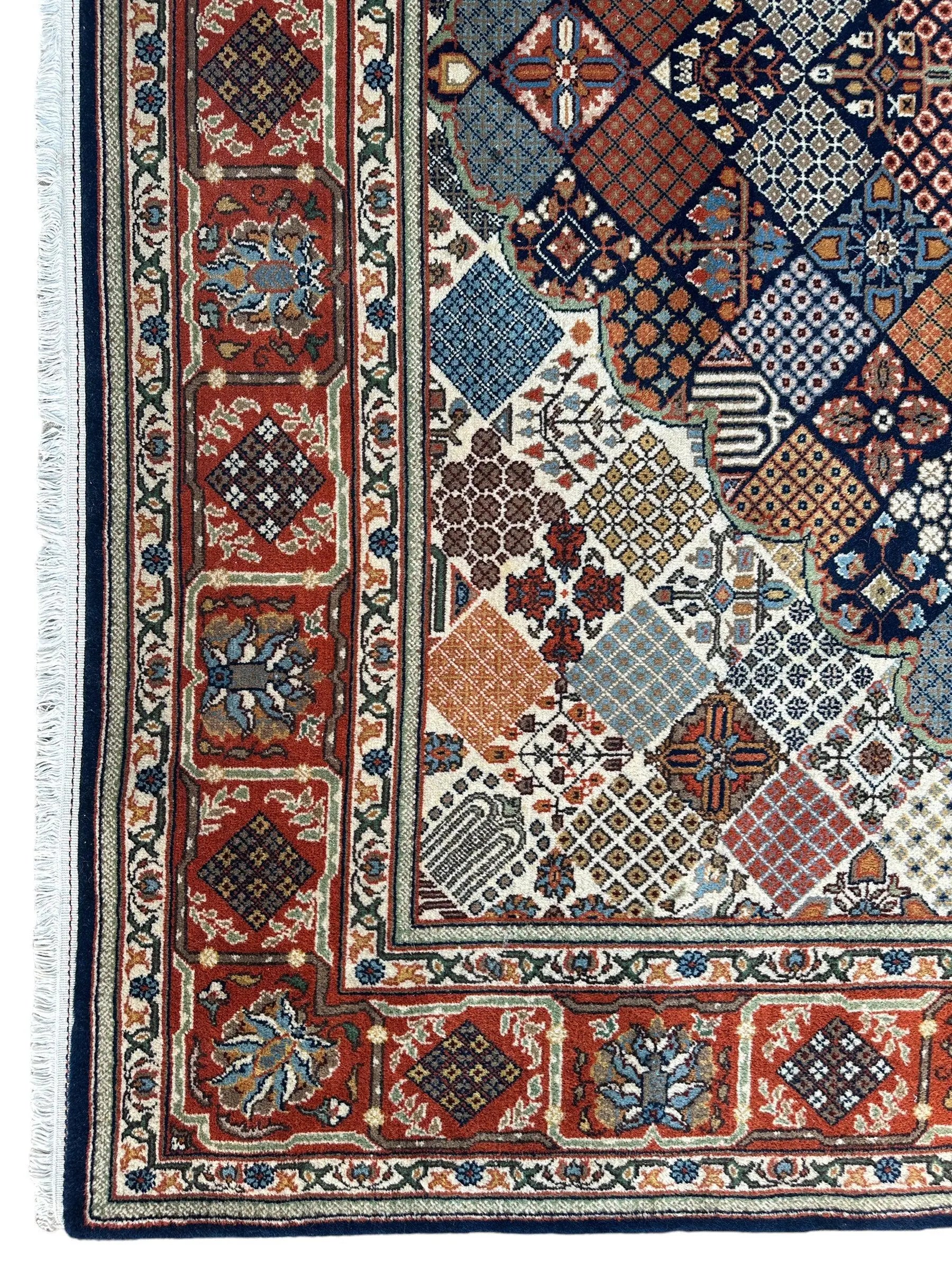 Hand-Knotted Indo-Joshegan Wool Rug – 12'2" x 9'1" – Geometric Medallion Design, Rich Warm Palette Rugistan