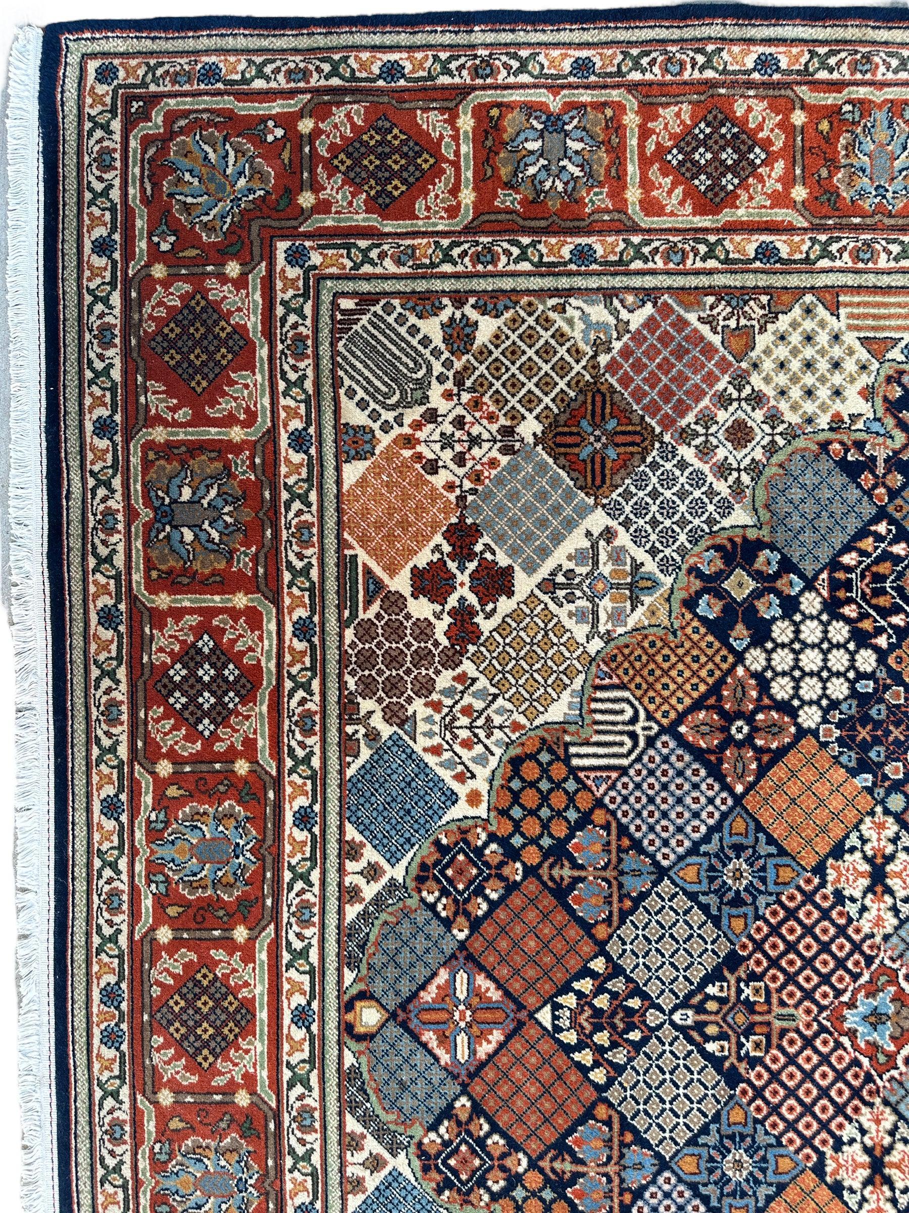 Hand-Knotted Indo-Joshegan Wool Rug – 12'2" x 9'1" – Geometric Medallion Design, Rich Warm Palette Rugistan