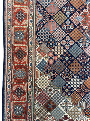 Hand-Knotted Indo-Joshegan Wool Rug – 12'2" x 9'1" – Geometric Medallion Design, Rich Warm Palette Rugistan