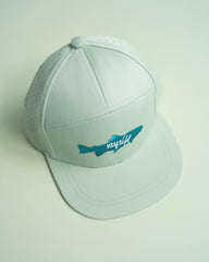 Light blue cap with a logo on a light green background