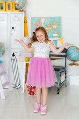 Young girl in a colorful room with educational decor