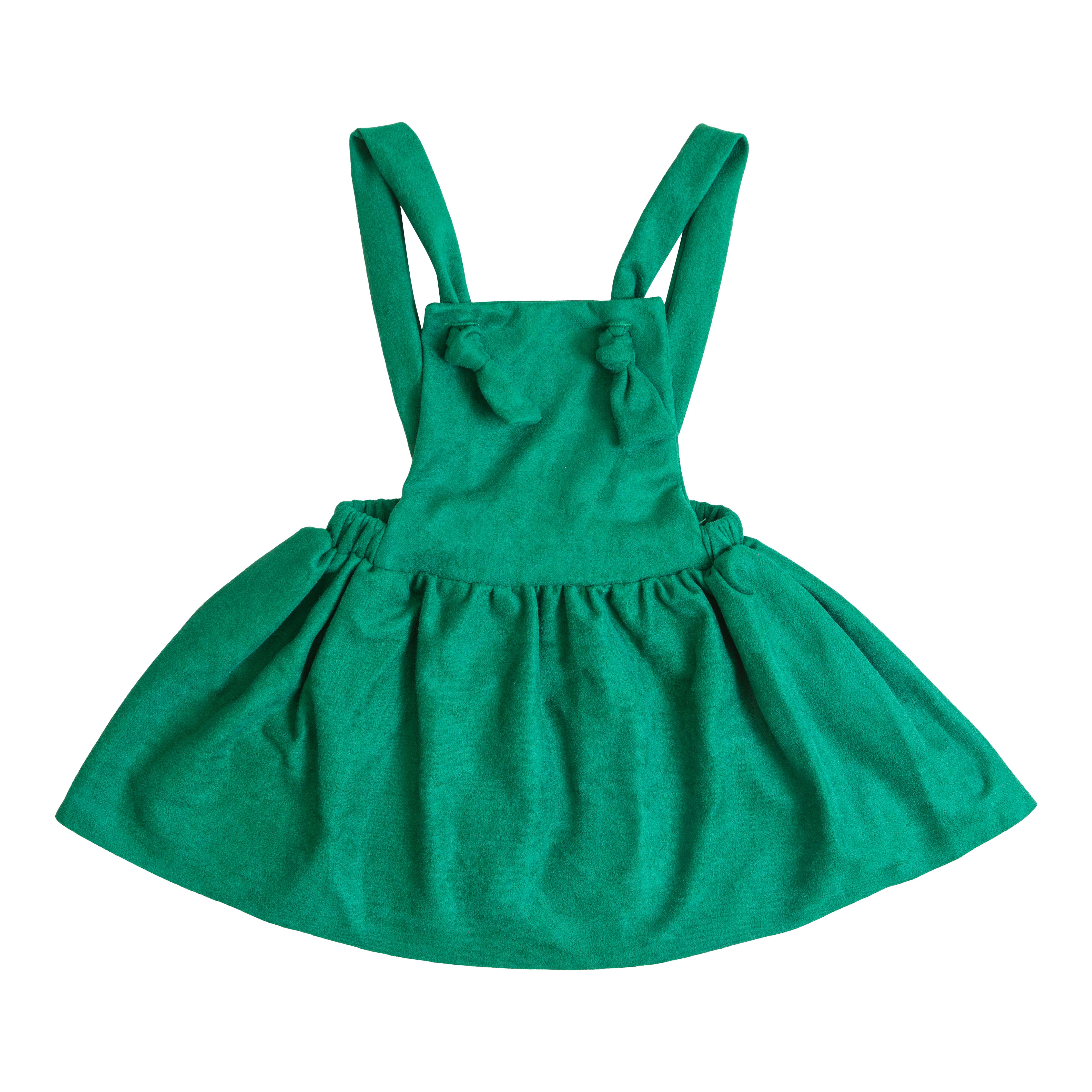 Green dress with suspenders on a white background