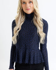 Peplum Turtleneck Top
