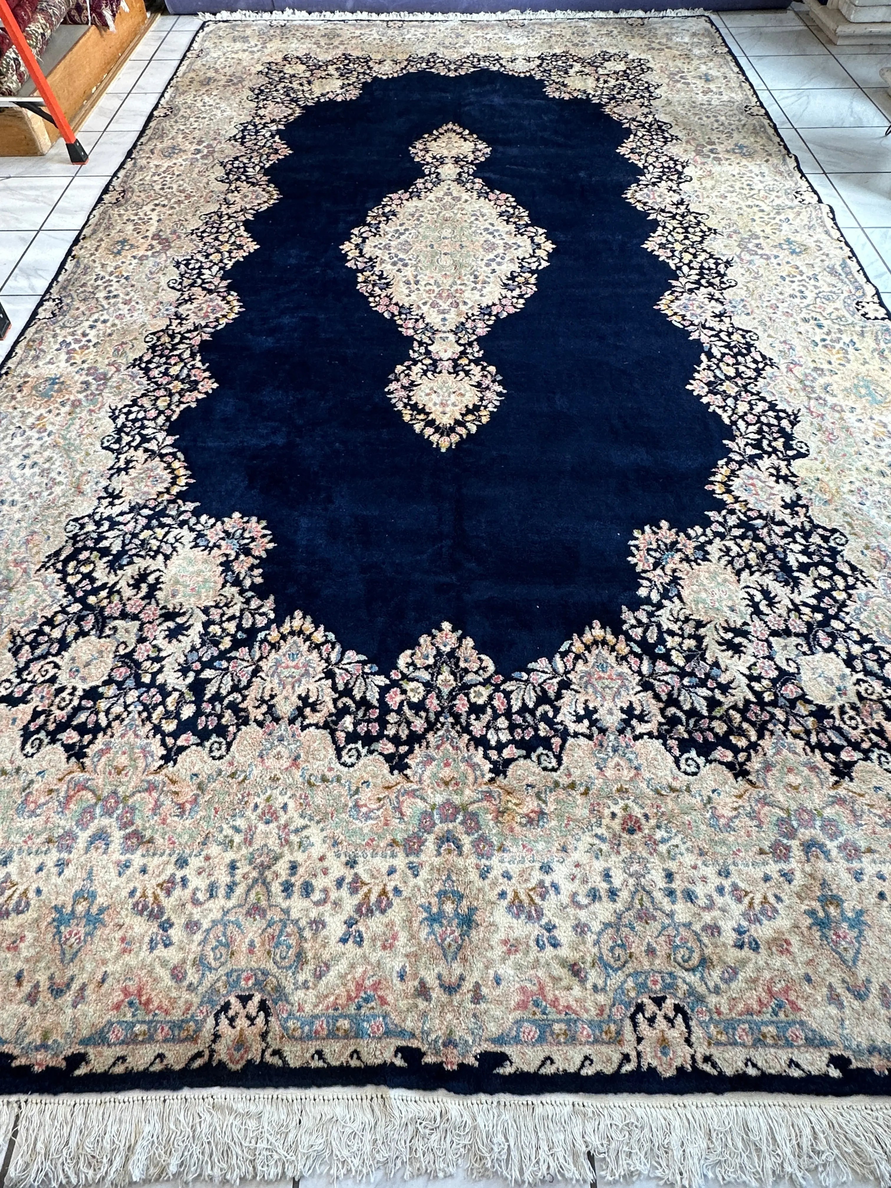 Palace-Size Vintage Royal Kirman Wool Rug – 9’9” x 17’2” – Hand-Knotted Persian Elegance with Deep Navy Field Rugistan