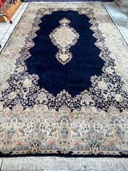 Palace-Size Vintage Royal Kirman Wool Rug – 9’9” x 17’2” – Hand-Knotted Persian Elegance with Deep Navy Field Rugistan