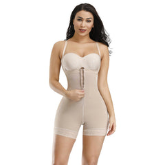 Woman wearing a beige shapewear bodysuit on a white background