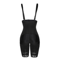 Black shapewear briefs with adjustable shoulder straps and lace trim at the lower legs, shown against a plain white background.
