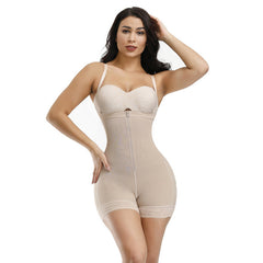 Woman wearing a beige shapewear garment on a white background