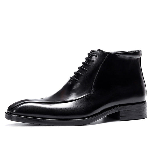 Black leather dress shoe on a white background