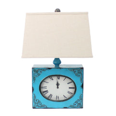 Table lamp with a metal base in the form of a clock