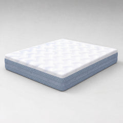 A mattress with a white quilted top and a light blue side border, shown at an angle on a neutral gray background.