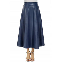 A person wearing a high-waisted brown PU leather long skirt with a flared design, paired with heels.