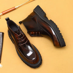 Brown leather boots with thick soles on a yellow background